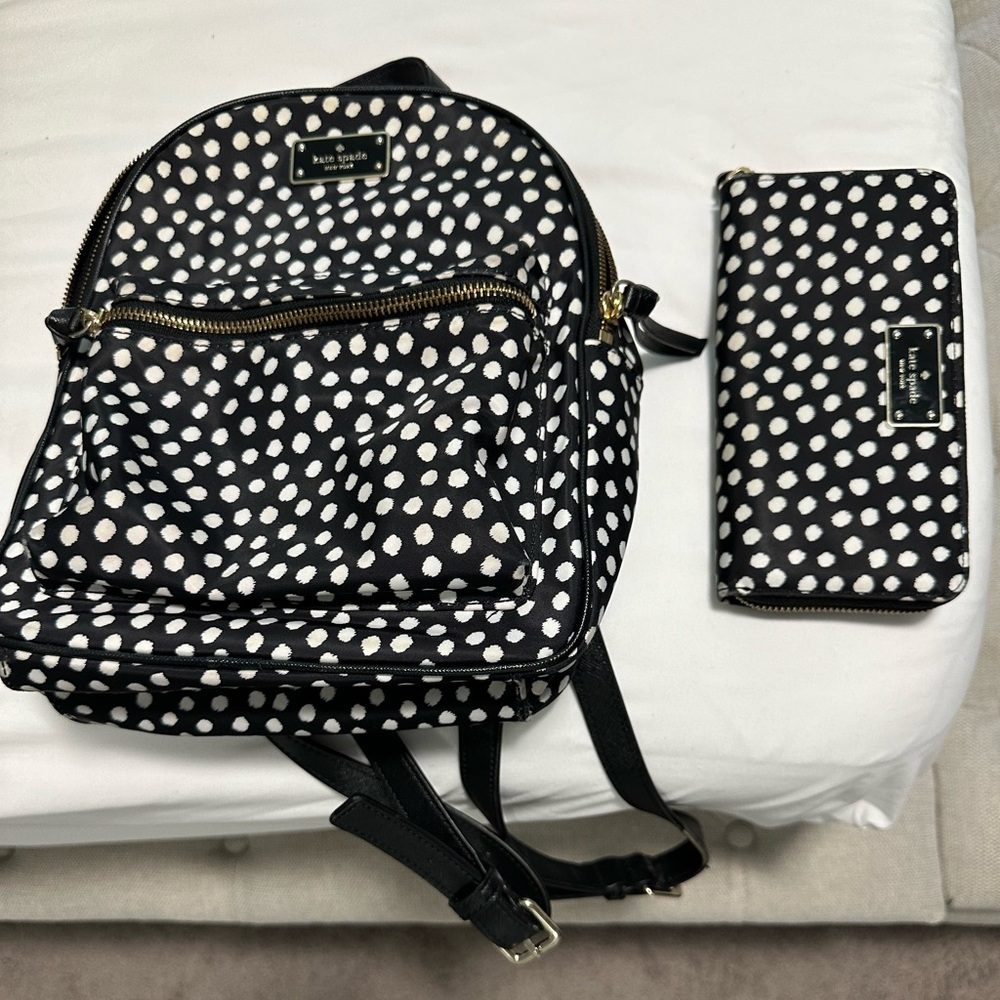 Kate spade polka dot backpack with matching wallet.